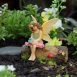 Fairy Vicky sitting on a log